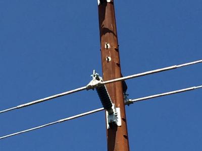 Steel pole with patina and blue sky background